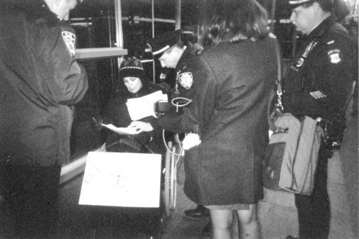 Nadina LaSpina, surrounded by police officers from the 17th precinct discusses terms with Captain Kevin Ward