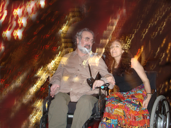 Danny and Nadina in their chairs surrounded by lights