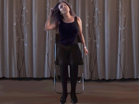 Nadina sitting in a chair wearing prostheses, then the prostheses disappear, then Nadina disappears